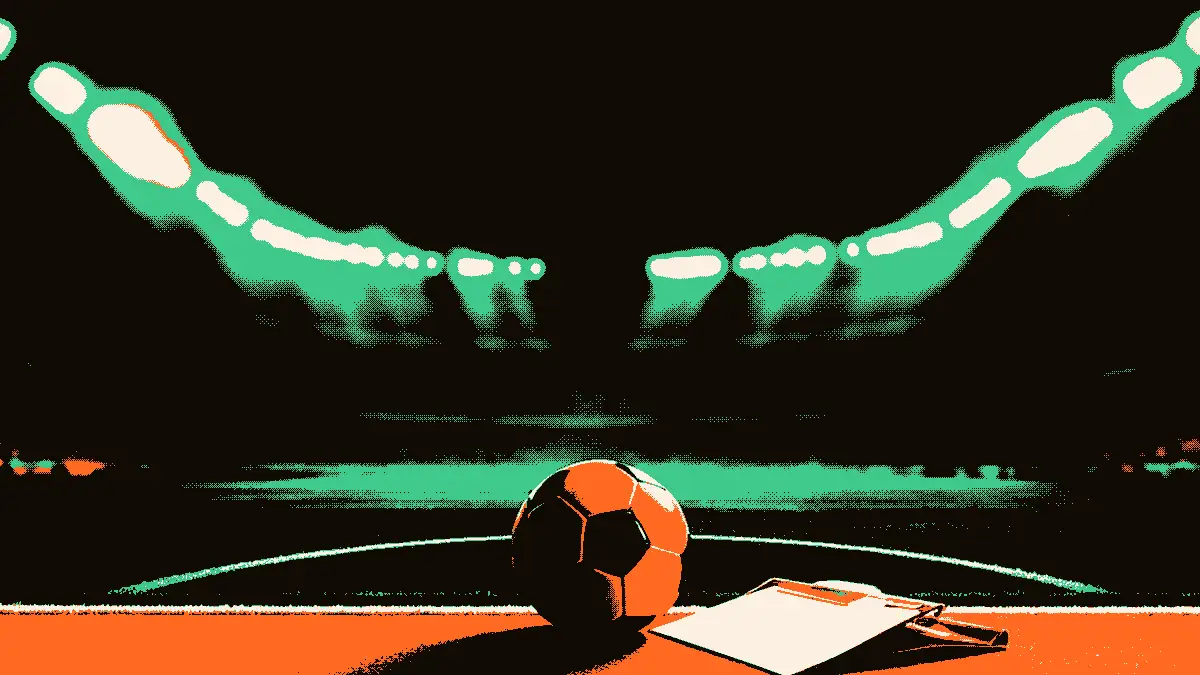 Un ballon de football posé sur le point de penalty d'un stade vide, avec un clipboard tactique d'entraîneur posé sur le banc au premier plan et des projecteurs diffusant une lumière douce dans la brume en arrière-plan.