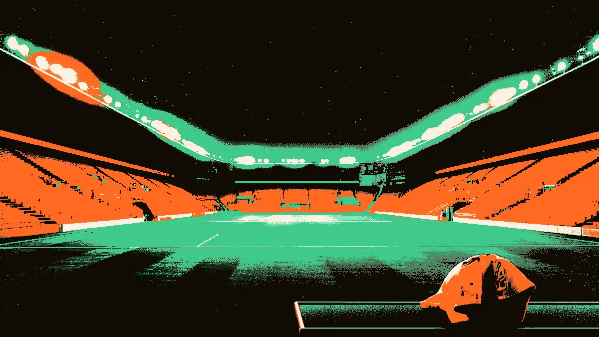 Une vue de l'entrée du tunnel d'un stade vide, avec un ballon posé sur le banc au premier plan et des projecteurs allumés au loin, évoquant la fin d'une controverse et le retour au terrain.