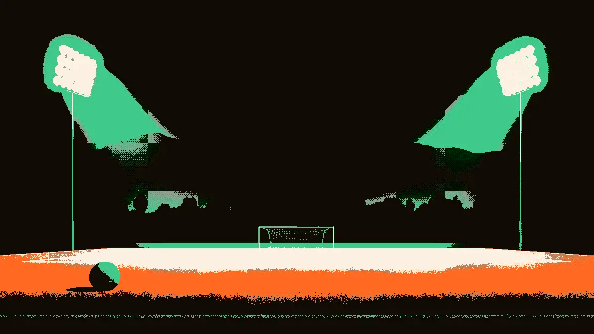 Un terrain de football désert sous la lumière crue des projecteurs, avec un ballon abandonné près des cages, évoquant un match amical qui ne se jouera pas.